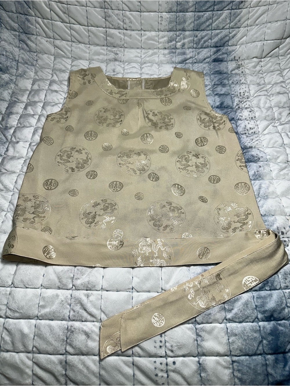 Sleeveless Cream Blouse with Metallic Medallion Detail